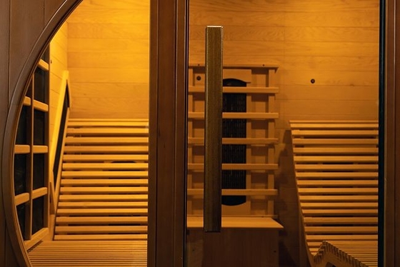 Sauna a infrarossi lontani a vetro temperato trasparente con illuminazione a LED e pannello a carbonio a spettro completo